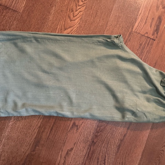 Experience comfort and style these green capris. - Picture 2 of 3